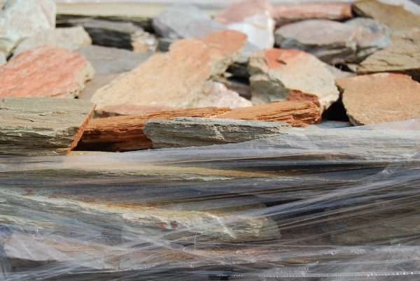 Autumn Brown Mix Quartzite Drypack Cladding — split-face quartzite, installed on a wall