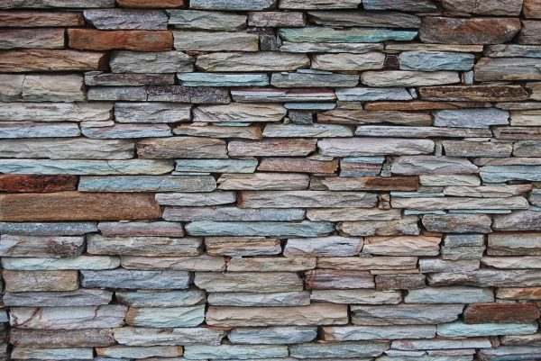Autumn Emerald Mix Quartzite Drypack Cladding — split-face quartzite, installed on a wall