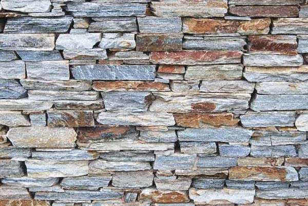 Ivory White Quartzite Cladding — split-face quartzite, installed on a wall
