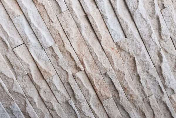 Lesotho Sandstone Riven Chipped Cladding — natural sandstone, installed on a wall