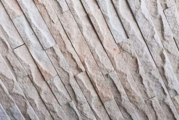 Lesotho Sandstone Riven Chipped Cladding — natural sandstone, installed on a wall