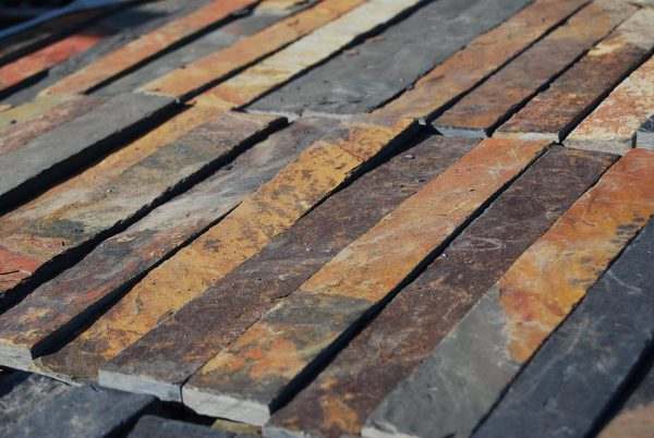 Multi Colour Slate Riven — natural slate, pieces laid out to show the colour mix