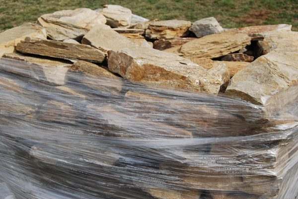 Autumn Brown Mix Quartzite Drypack Cladding — split-face quartzite, installed on a wall