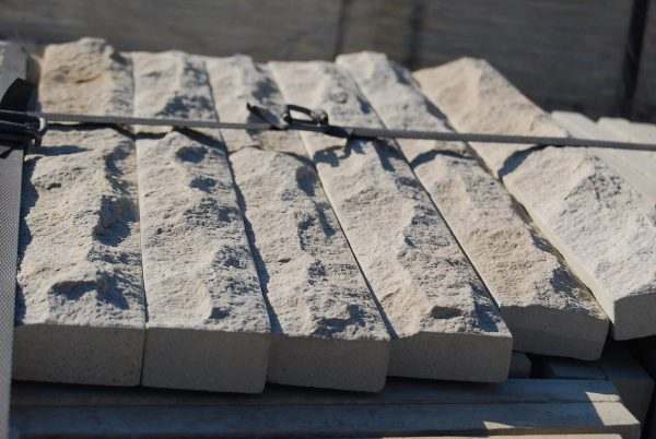 Lesotho Sandstone Riven Chipped Cladding — natural sandstone, installed on a wall
