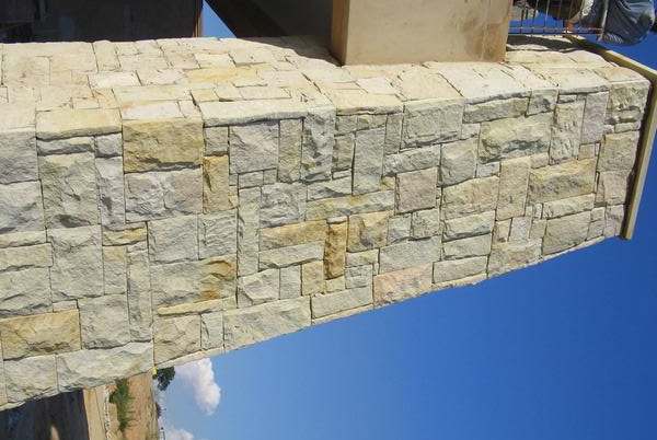 Lesotho Sandstone Drypack Cladding — natural sandstone, installed on a wall